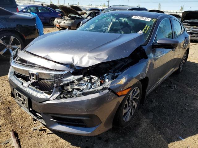 Photo 2 from auction – 2018 HONDA CIVIC EX with VIN 19XFC2F78JE031703