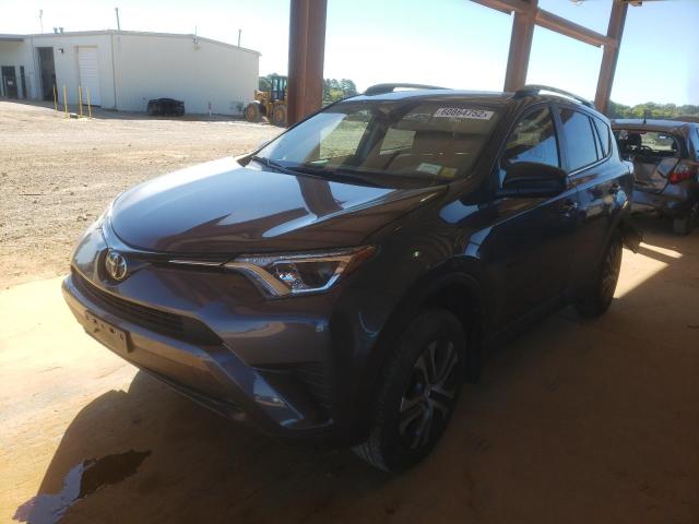 Photo 2 from auction – 2018 TOYOTA RAV4 LE with VIN 2T3BFREV7JW855954
