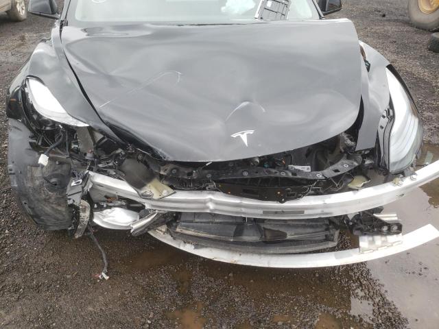 Photo 9 from auction – 2022 TESLA MODEL 3 with VIN 5YJ3E1EA3NF166477