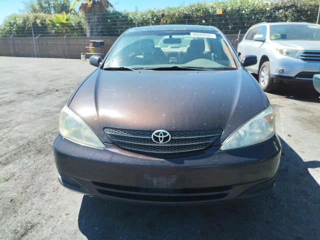 Photo 9 from auction – 2003 TOYOTA CAMRY LE with VIN 4T1BE30KX3U711601