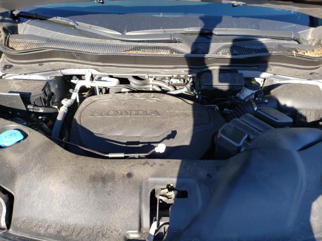 Photo 7 from auction – 2021 HONDA PASSPORT E with VIN 5FNYF8H5XMB013085