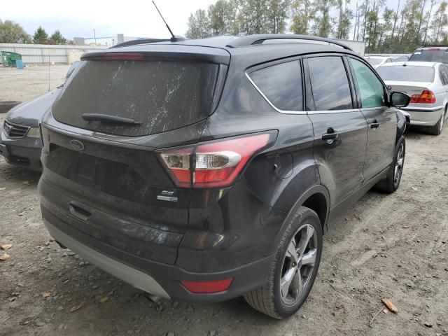 Photo 4 from auction – 2017 FORD ESCAPE SE with VIN 1FMCU9GD7HUC18855