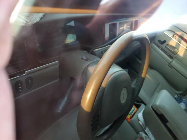 Photo 8 from auction – 2004 LINCOLN TOWN CAR E with VIN 1LNHM81W24Y682035