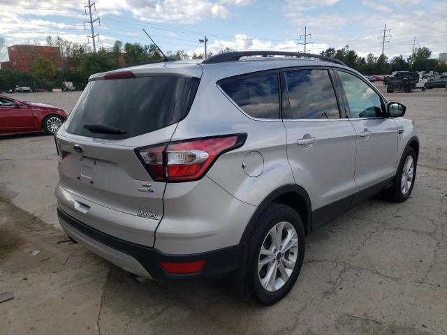 Photo 4 from auction – 2018 FORD ESCAPE SE with VIN 1FMCU9GD1JUA73494