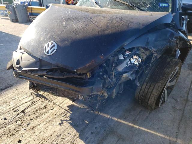 Photo 9 from auction – 2014 VOLKSWAGEN BEETLE TUR with VIN 3VWVS7AT4EM638948