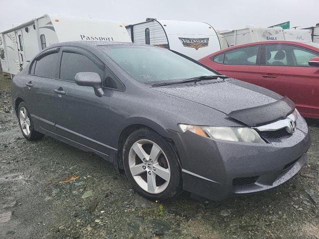 HONDA CIVIC LX-S 2011 with VIN 2HGFA1E69BH002243 - Photo from auction