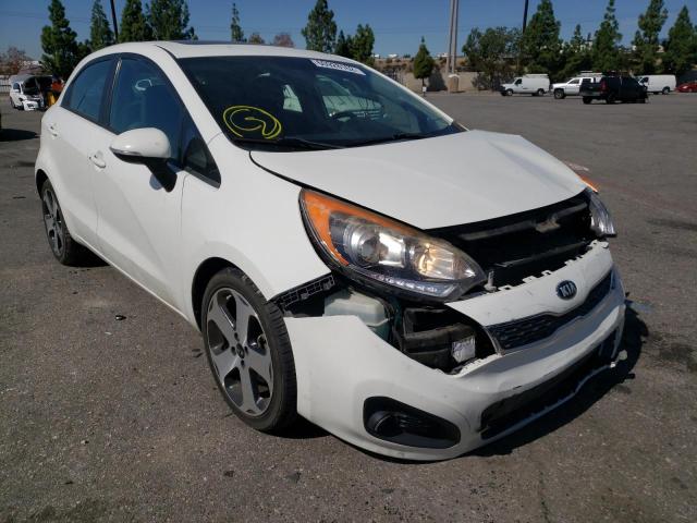 KIA RIO EX 2014 with VIN KNADN5A37E6414354 - Photo from auction