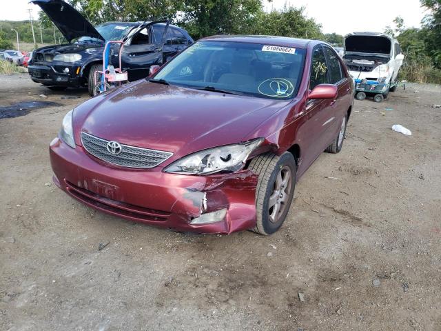 Photo 2 from auction – 2002 TOYOTA CAMRY LE with VIN JTDBF30K520086113