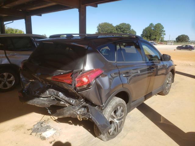 Photo 4 from auction – 2018 TOYOTA RAV4 LE with VIN 2T3BFREV7JW855954