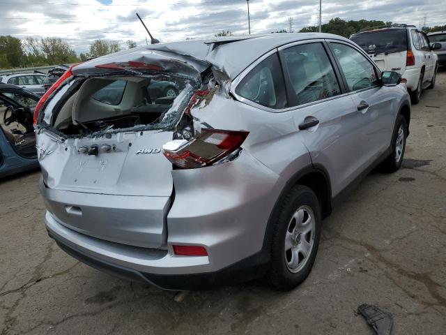 Photo 4 from auction – 2016 HONDA CR-V LX with VIN 5J6RM4H39GL098207