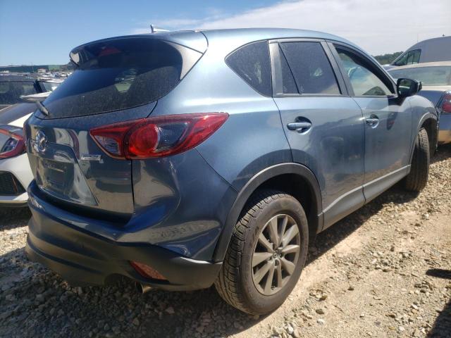 Photo 4 from auction – 2016 MAZDA CX-5 with VIN JM3KE2CY0G0693385