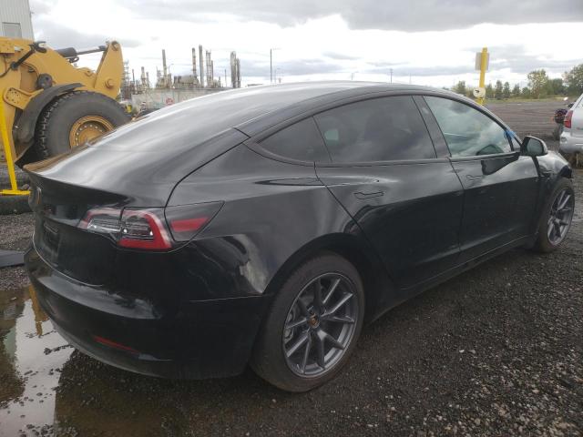 Photo 4 from auction – 2022 TESLA MODEL 3 with VIN 5YJ3E1EA3NF166477