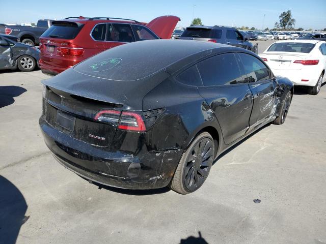 Photo 4 from auction – 2022 TESLA MODEL 3 with VIN 5YJ3E1EC4NF317330