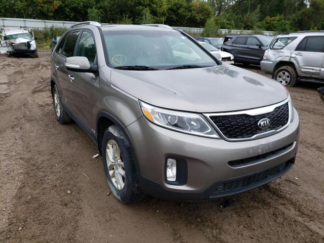 KIA SORENTO LX 2015 with VIN 5XYKTCA64FG653888 - Photo from auction