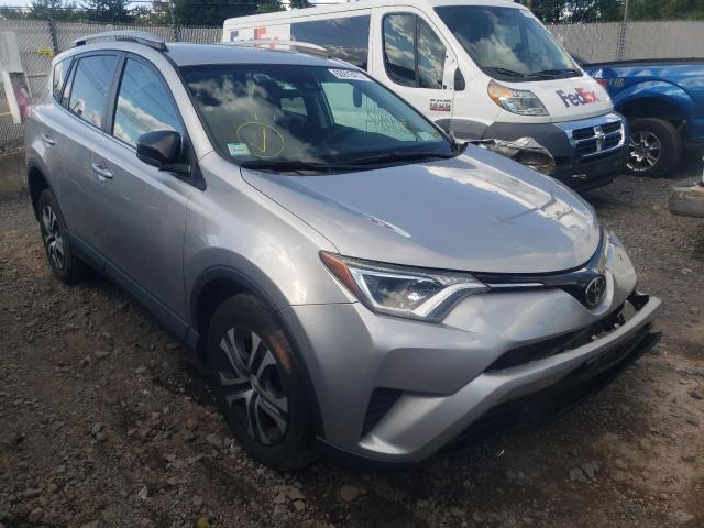 TOYOTA RAV4 LE 2017 with VIN 2T3BFREV2HW594372 - Photo from auction