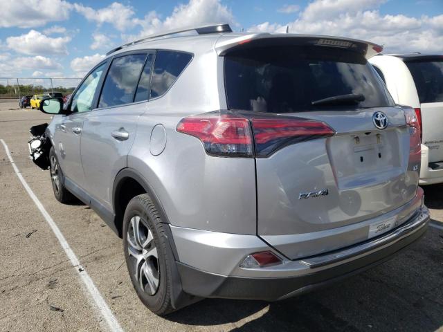 Photo 3 from auction – 2018 TOYOTA RAV4 LE with VIN 2T3ZFREV3JW457817