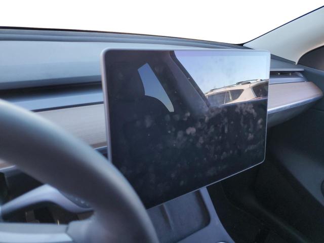 Photo 8 from auction – 2021 TESLA MODEL Y with VIN 5YJYGAEE2MF151051