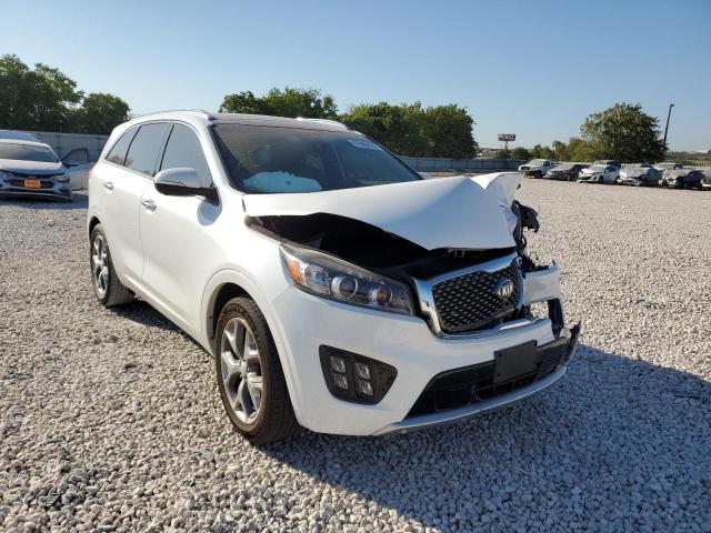 KIA SORENTO SX 2016 with VIN 5XYPK4A16GG028056 - Photo from auction