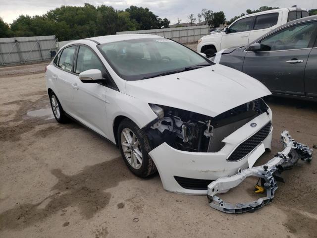 FORD FOCUS SE 2016 with VIN 1FADP3F28GL318390 - Photo from auction