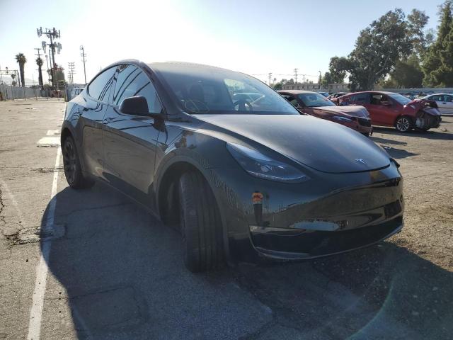TESLA MODEL Y 2022 with VIN 7SAYGDEE0NF535397 - Photo from auction