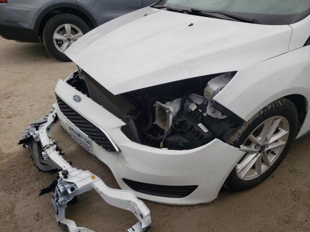 Photo 10 from auction – 2016 FORD FOCUS SE with VIN 1FADP3F28GL318390