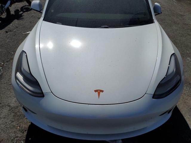 Photo 7 from auction – 2021 TESLA MODEL 3 with VIN 5YJ3E1EA9MF929875