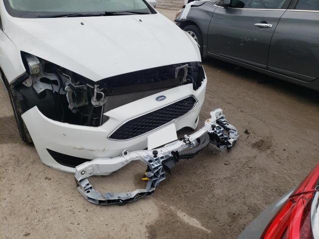 Photo 9 from auction – 2016 FORD FOCUS SE with VIN 1FADP3F28GL318390
