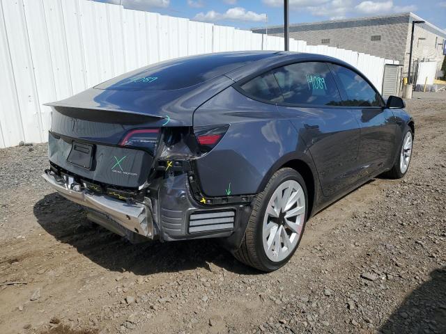 Photo 4 from auction – 2021 TESLA MODEL 3 with VIN 5YJ3E1EB4MF084653