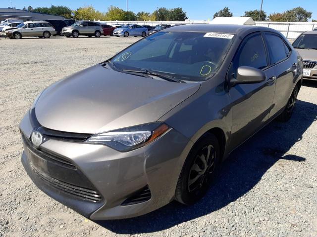 Photo 2 from auction – 2017 TOYOTA COROLLA L with VIN 5YFBURHE7HP624087