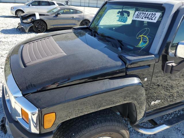 Photo 9 from auction – 2007 HUMMER H3 with VIN 5GTDN13E678111981