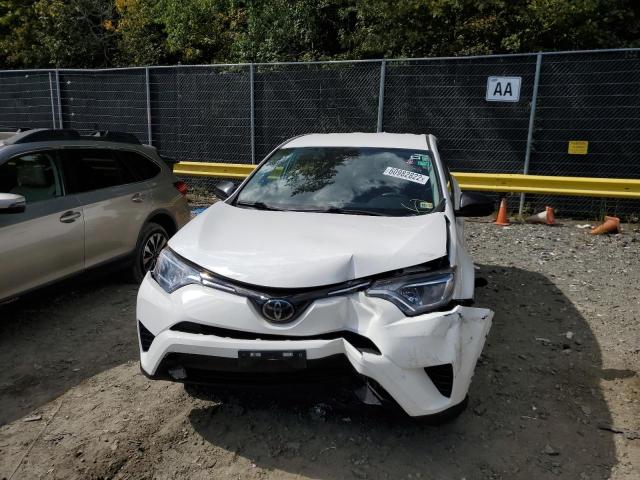 Photo 9 from auction – 2018 TOYOTA RAV4 LE with VIN 2T3BFREV6JW787212