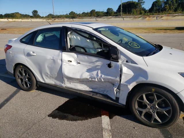 Photo 9 from auction – 2014 FORD FOCUS SE with VIN 1FADP3F22EL151229