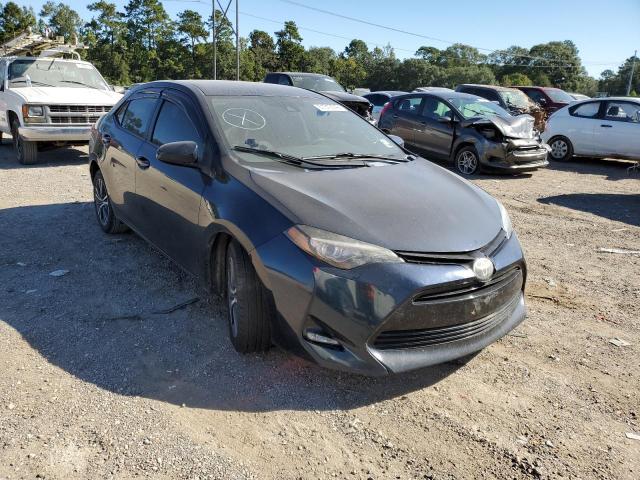 TOYOTA COROLLA L 2017 with VIN 5YFBURHE1HP587487 - Photo from auction