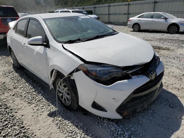TOYOTA COROLLA L 2019 with VIN 5YFBURHE0KP861348 - Photo from auction