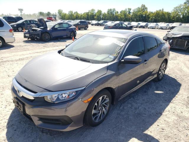 Photo 2 from auction – 2018 HONDA CIVIC EX with VIN 19XFC2F73JE020950