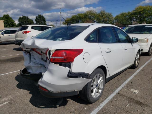 Photo 4 from auction – 2016 FORD FOCUS SE with VIN 1FADP3F21GL358696