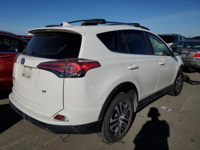 Photo 4 from auction – 2017 TOYOTA RAV4 LE with VIN JTMZFREV1HJ143592