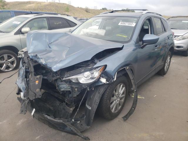 Photo 2 from auction – 2014 MAZDA CX-5 TOURI with VIN JM3KE4CYXE0408930