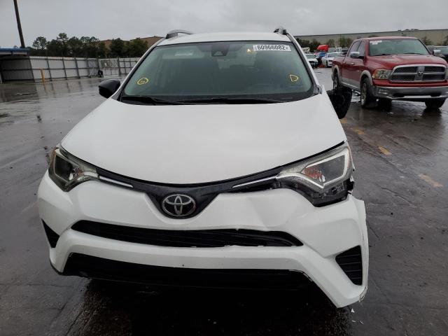 Photo 9 from auction – 2018 TOYOTA RAV4 LE with VIN JTMZFREV4JJ187219