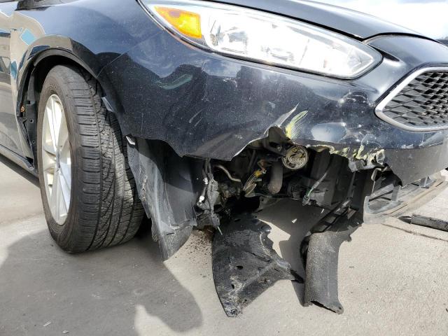 Photo 9 from auction – 2016 FORD FOCUS SE with VIN 1FADP3K2XGL379620