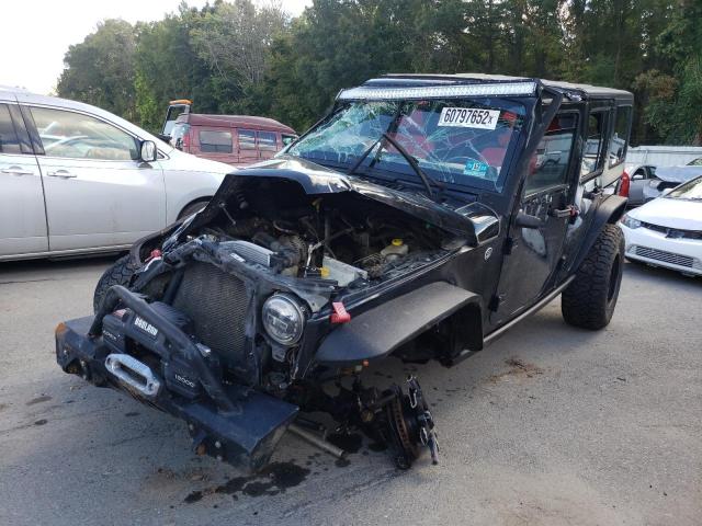 Photo 2 from auction – 2011 JEEP WRANGLER U with VIN 1J4HA5H14BL633283