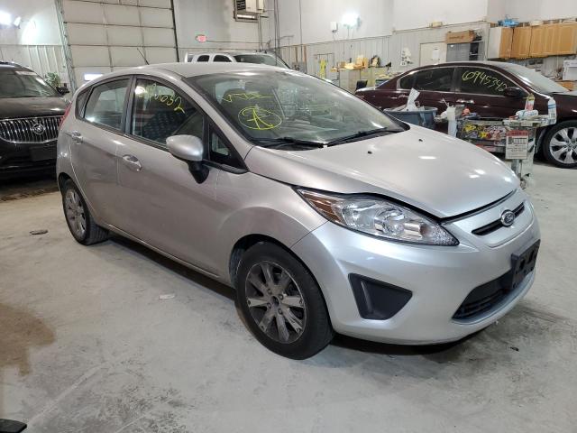 FORD FIESTA SE 2011 with VIN 3FADP4EJ8BM148666 - Photo from auction