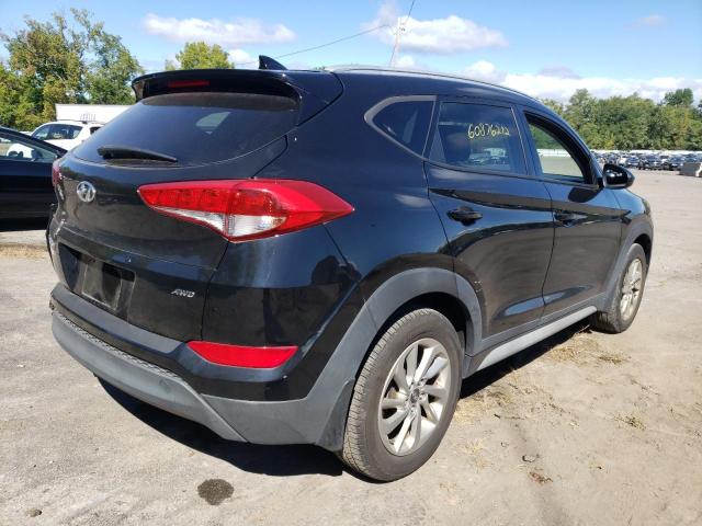 Photo 4 from auction – 2018 HYUNDAI TUCSON SEL with VIN KM8J3CA47JU696795