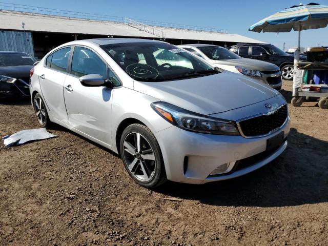 KIA FORTE EX 2017 with VIN 3KPFN4A85HE071771 - Photo from auction