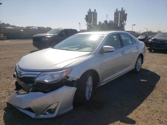 Photo 2 from auction – 2014 TOYOTA CAMRY HYBR with VIN 4T1BD1FK0EU116239