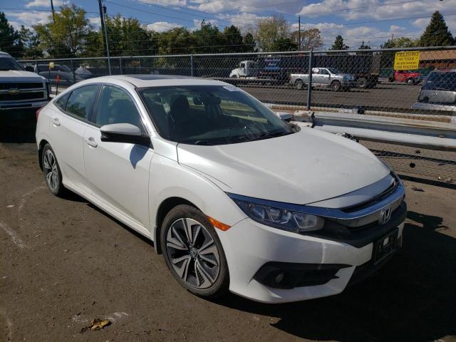 HONDA CIVIC EXL 2018 with VIN JHMFC1F77JX028039 - Photo from auction
