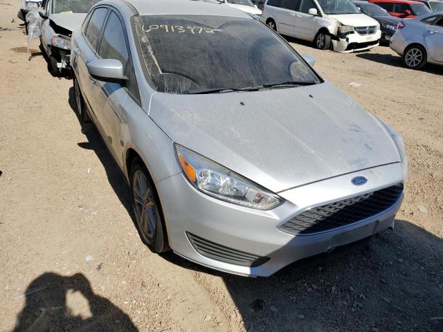 FORD FOCUS SE 2018 with VIN 1FADP3F24JL325098 - Photo from auction