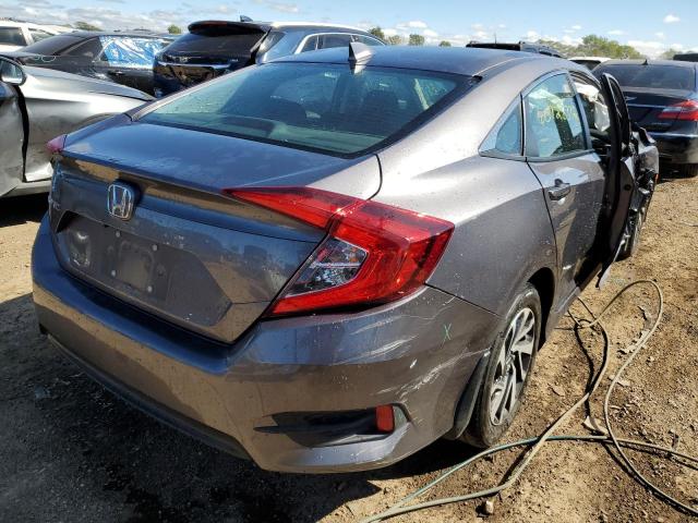 Photo 4 from auction – 2018 HONDA CIVIC EX with VIN 19XFC2F78JE031703