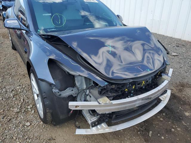 Photo 9 from auction – 2021 TESLA MODEL 3 with VIN 5YJ3E1EB4MF084653