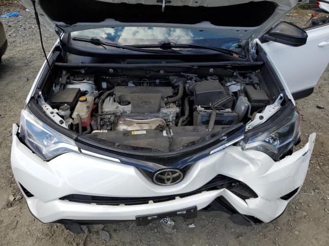 Photo 7 from auction – 2018 TOYOTA RAV4 LE with VIN 2T3BFREV6JW787212
